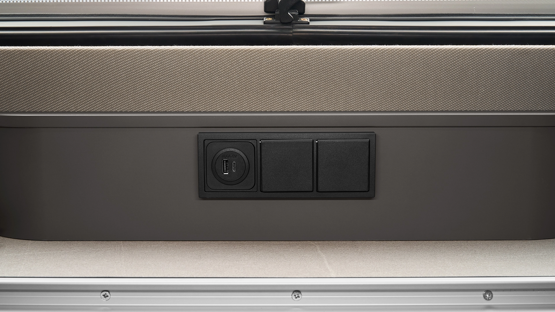 Socket package under the window in the Novaline caravan by Eriba