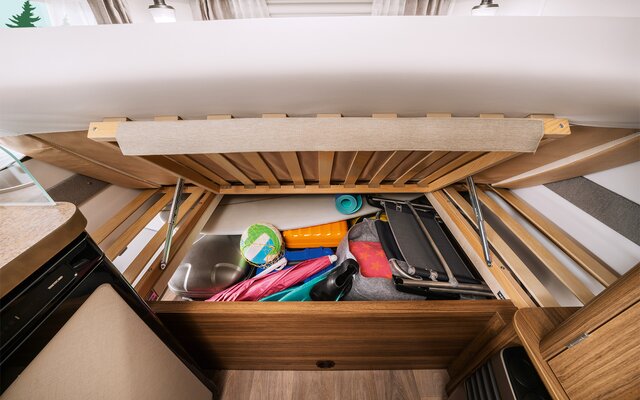 Generous storage space under the beds: You can easily store even bulky items here.