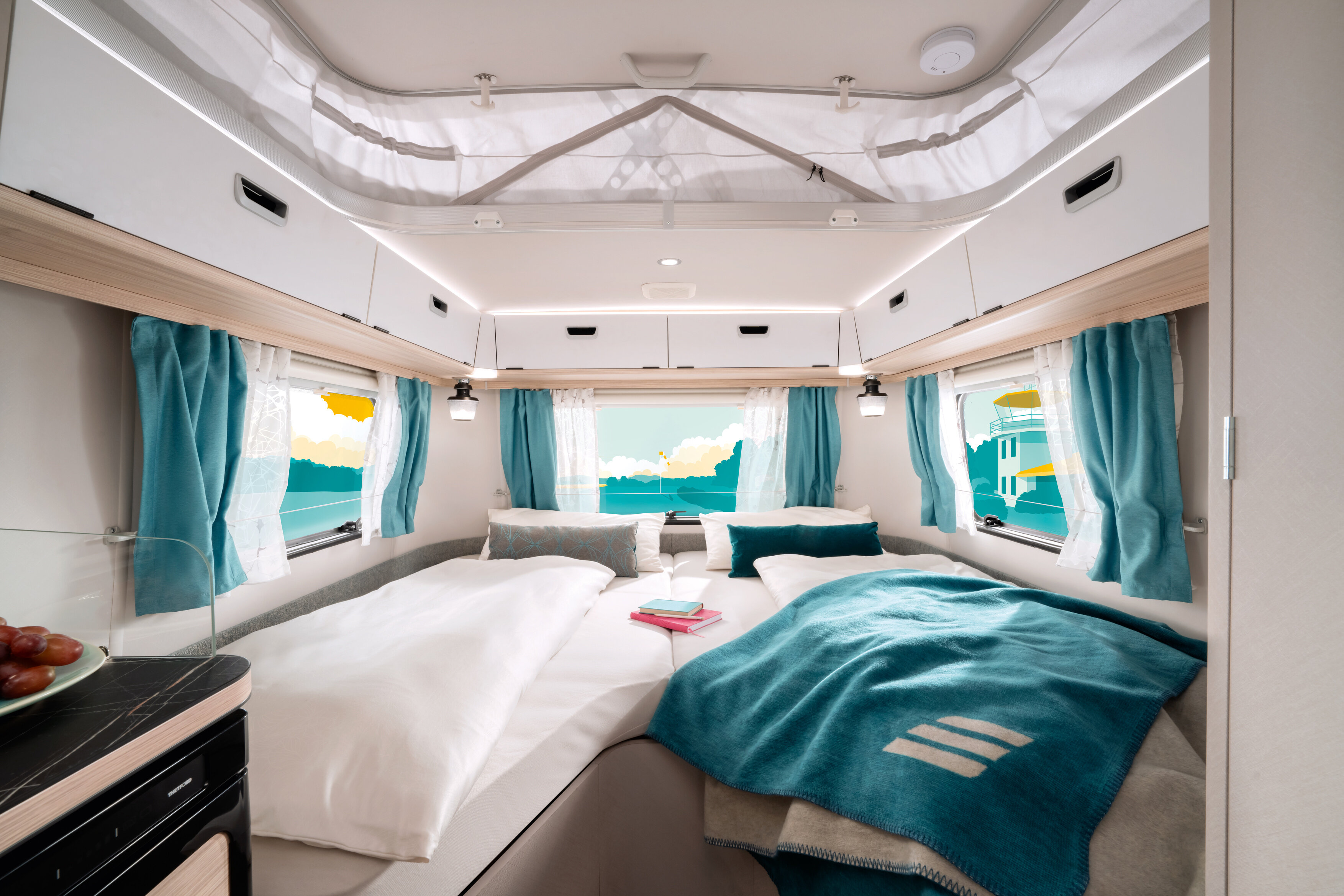 Relax on the longitudinally aligned lounge area, surrounded by comfort and style.