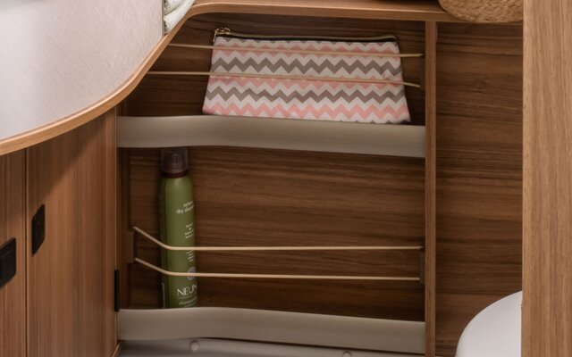 Ergonomic shelves and compartments with integrated straps to secure utensils offer space for everything you need on the go.