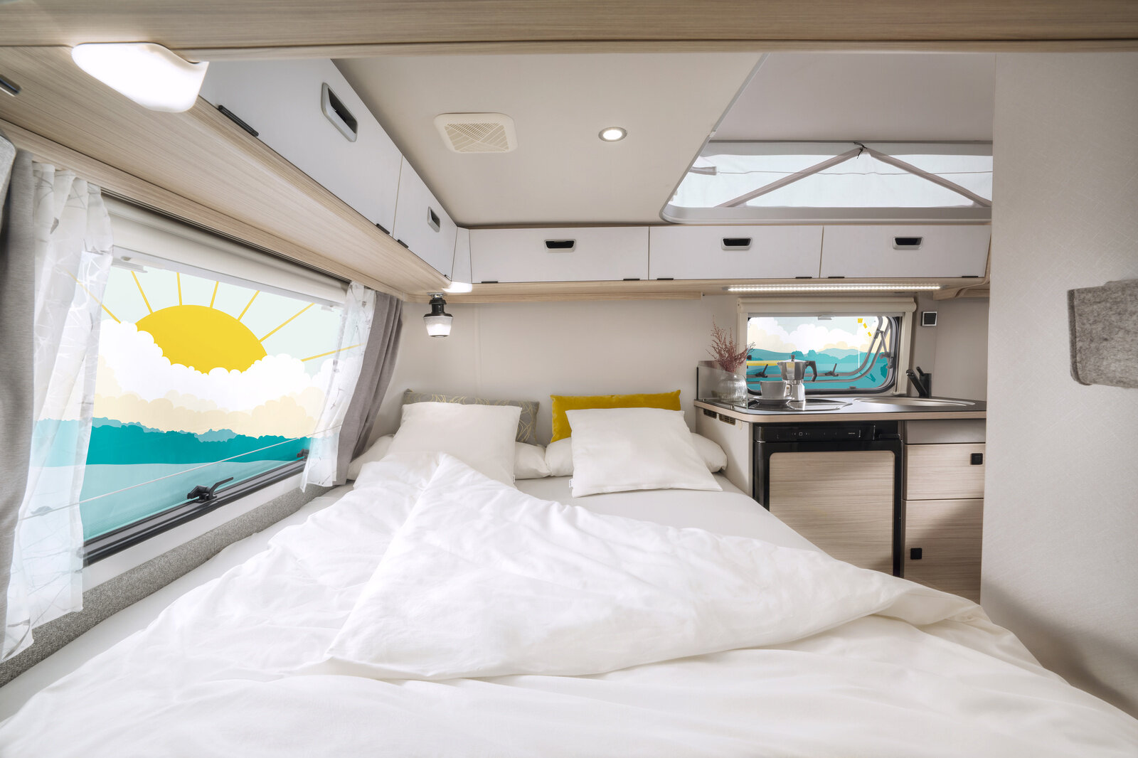 There is plenty of space for your holiday wardrobe in the roof storage cupboards.