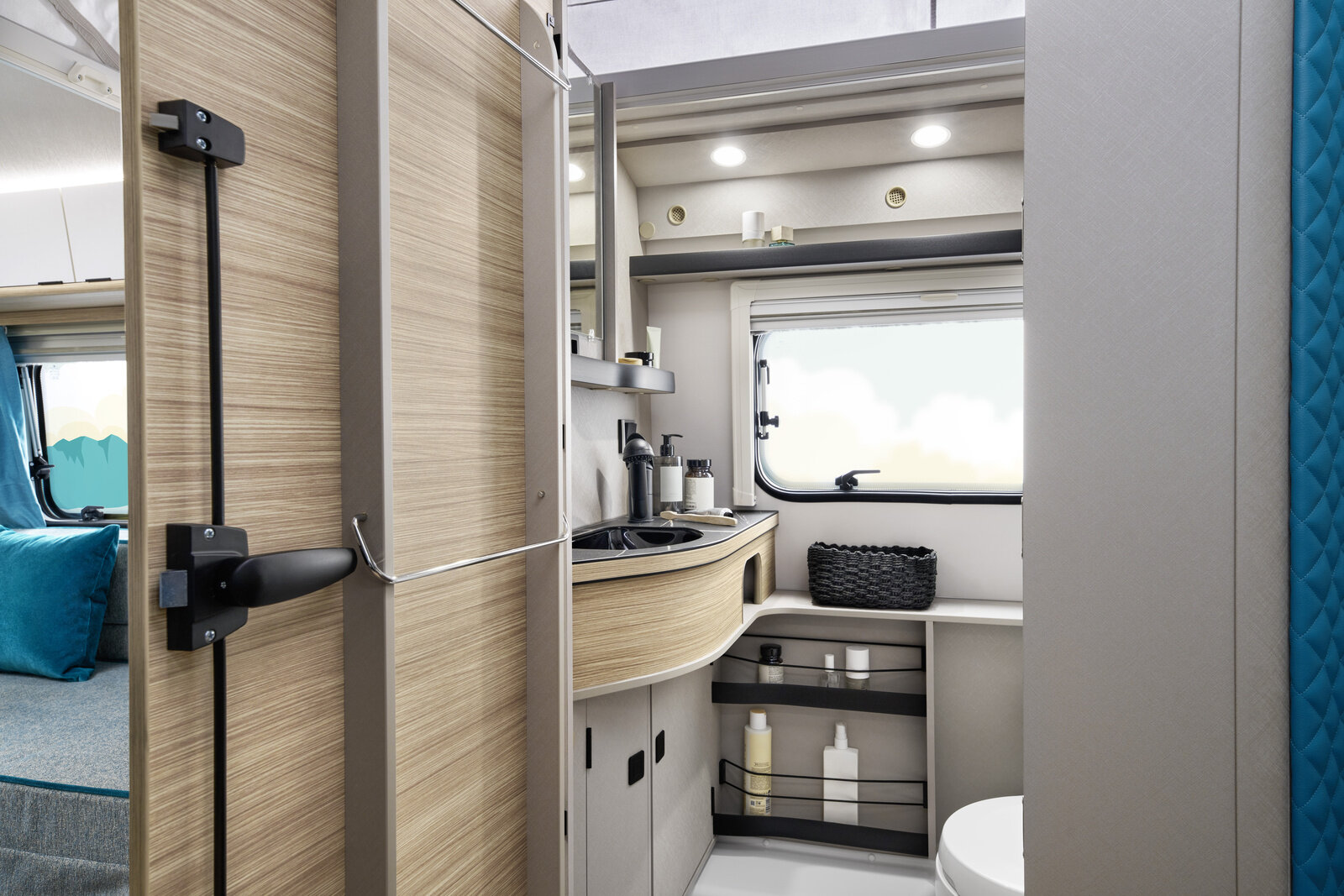 The clever layout of the bathroom cabinets and storage compartments creates plenty of space in an economical area.