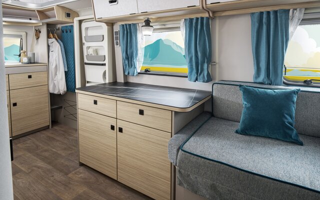 The front seating area in the living area is not only extremely comfortable, but also offers plenty of storage space for all your essentials.