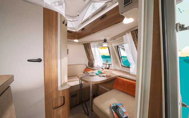 Plan your next big trip or simply enjoy a moment of peace in this inviting corner. (Legend line with Biarritz furniture decor and Ventura fabric combination.)