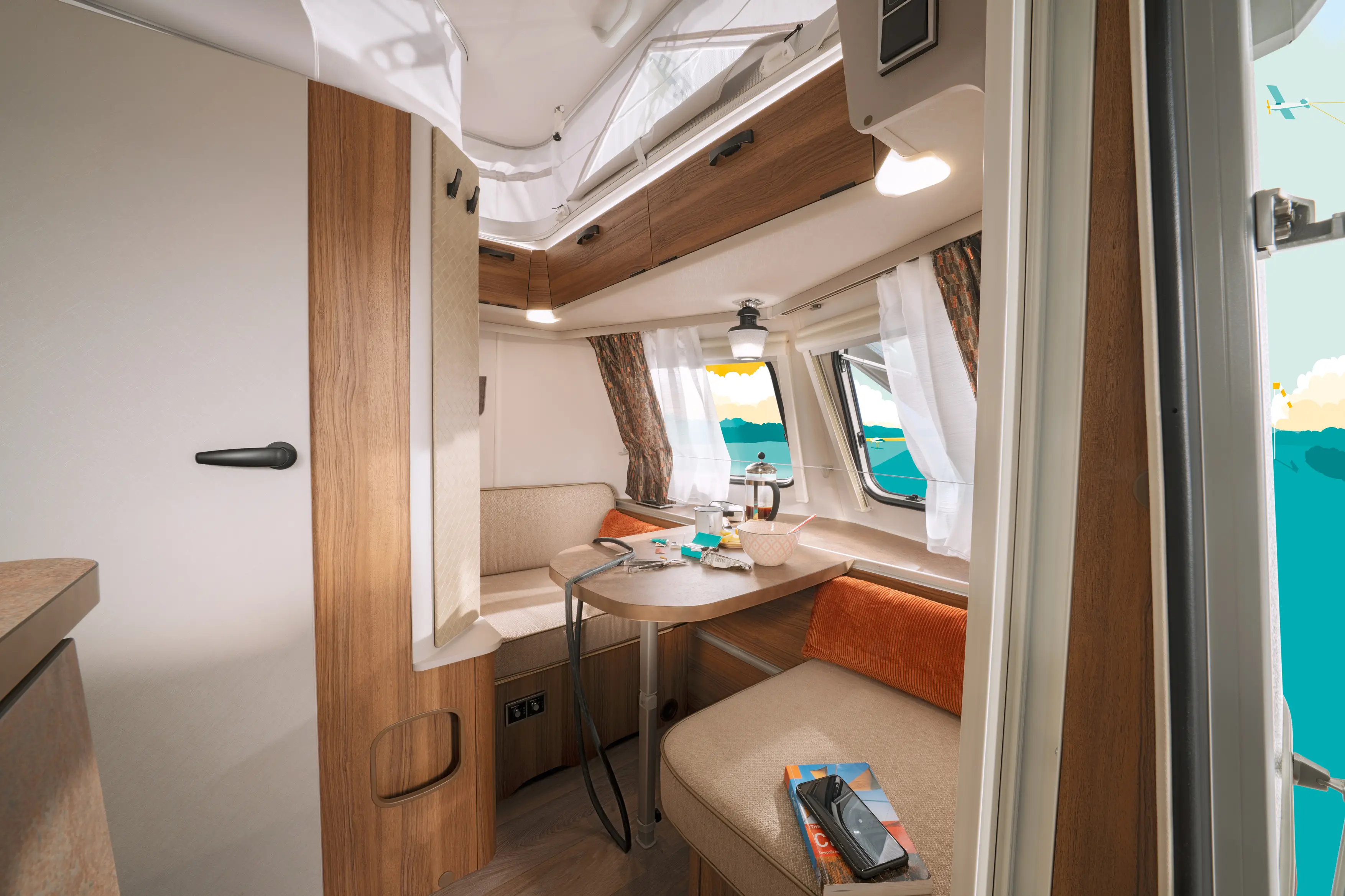 Plan your next big trip or simply enjoy a moment of peace in this inviting corner. (Legend line with Biarritz furniture decor and Ventura fabric combination.)