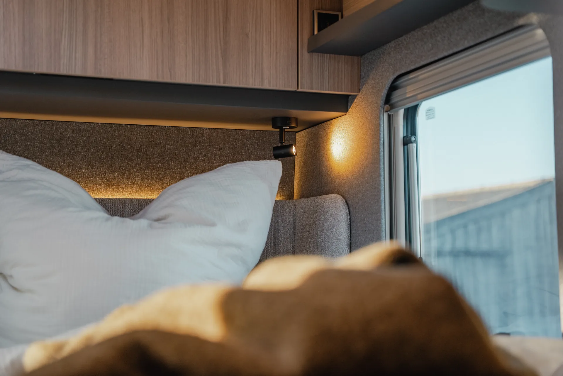 Hymer sleeping comfort with a multi‑zone cold foam mattress and plate spring system – for restful nights on every journey.
