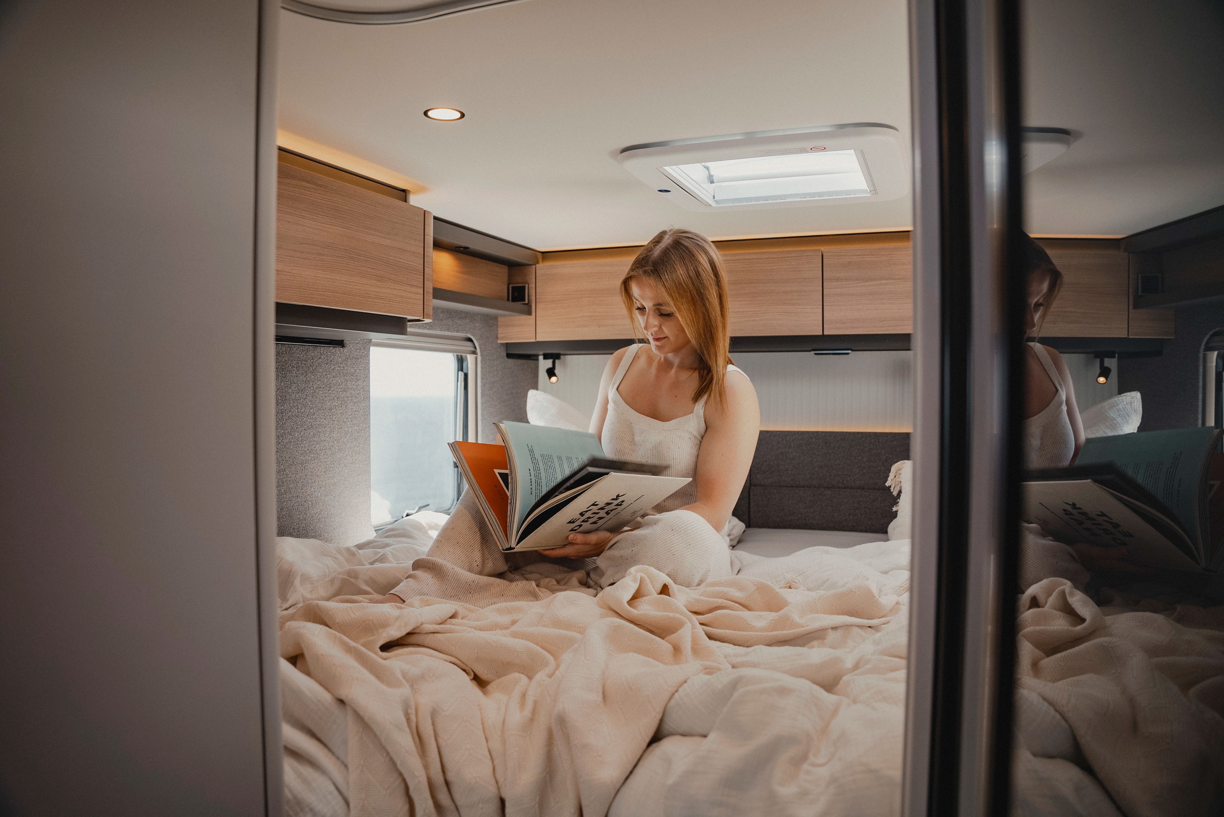 Natural light fills the stylish bedroom from almost all sides with a warm and inviting atmosphere. The elegant Matara Teak furniture decor perfectly complements the bright ambience and creates a luxurious retreat for relaxation and enjoyment.