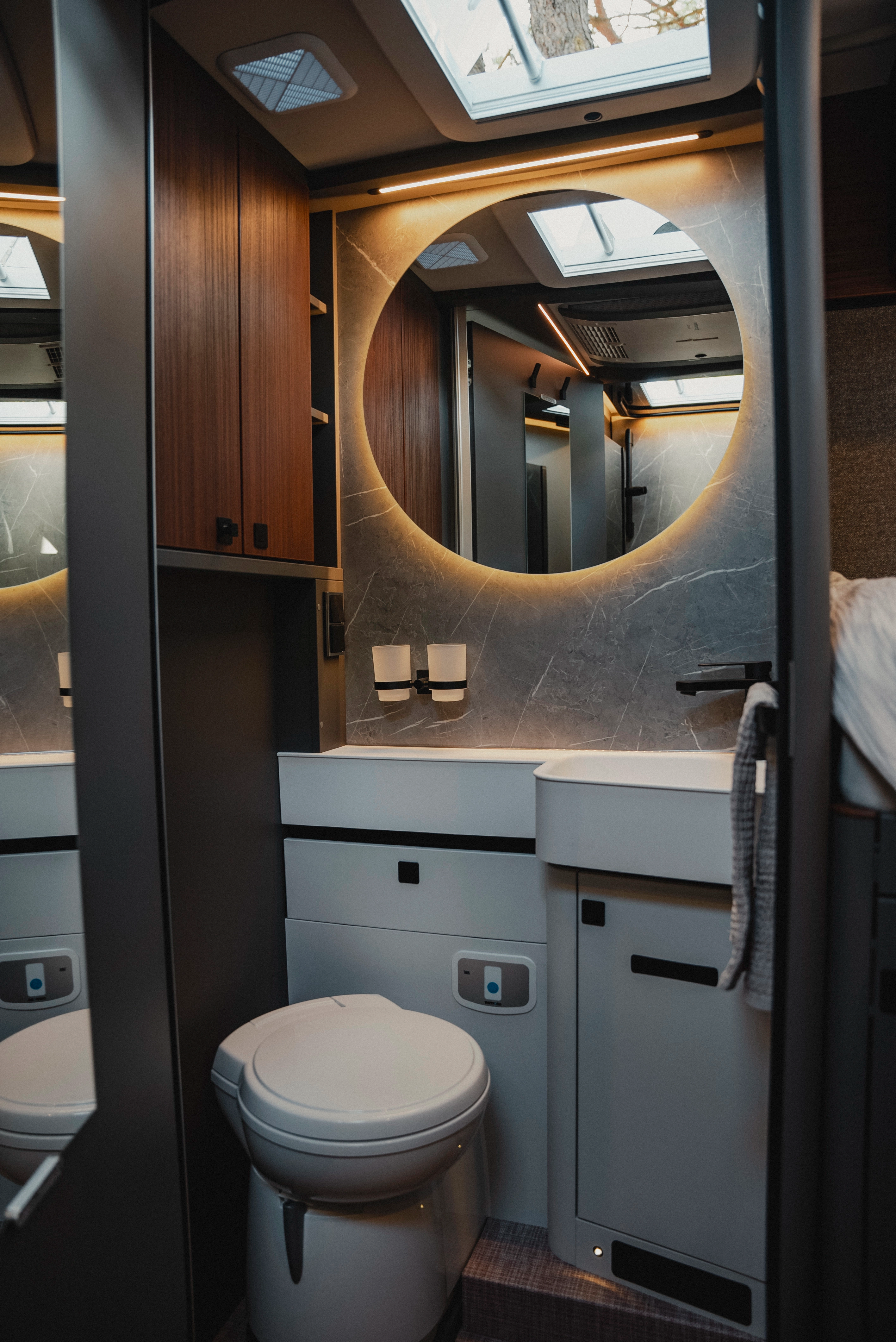Modern bathroom ambience with stylish lighting and thoughtful layout - this is your wellness temple on the go.